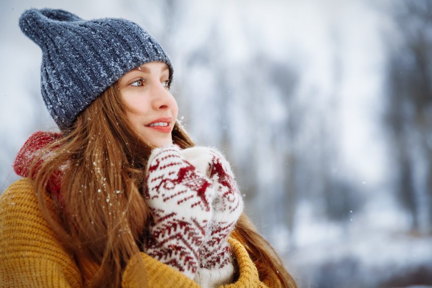 Winter Young Woman Portrait. Beauty Joyful Model Girl Laughing And Having Fun In Winter Park. Beautiful Young Female Outdoors, Enjoying Nature, Wintertime