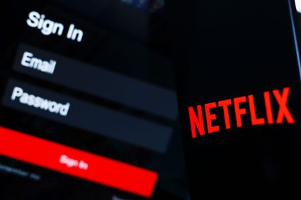In This Photo Illustration, The Netflix Logo Is Displayed On